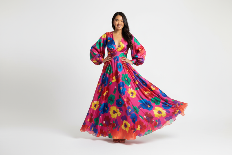 Create an image of an Asian woman wearing a beautiful maxi colored dress. White background.